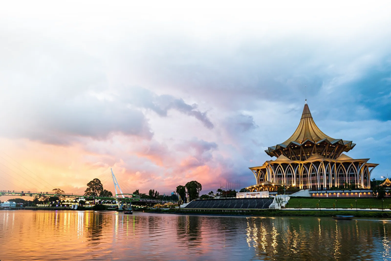 The Sarawak State Legislative Assembly building on the Sarawak River at dusk, Kuching